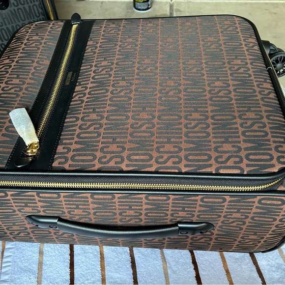 Moschino 18 Inch Logo Spinner Swuitcases each sold separately 500each or 900both - Picture 5 of 10